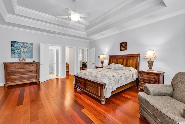 120 Whitemarsh Ct, Murrells Inlet, SC 29576 - bedroom with baseboards, dark wood-style flooring, and a tray ceiling