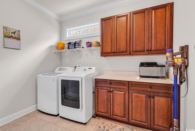120 Whitemarsh Ct, Murrells Inlet, SC 29576 - laundry area featuring washing machine and clothes dryer, baseboards, cabinet space, crown molding, and light tile patterned floors