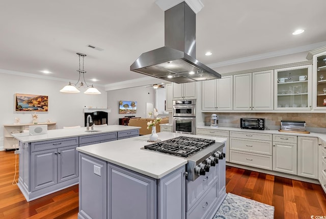 120 Whitemarsh Ct, Murrells Inlet, SC 29576 - kitchen featuring gray cabinetry, island range hood, a kitchen island, and stainless steel appliances