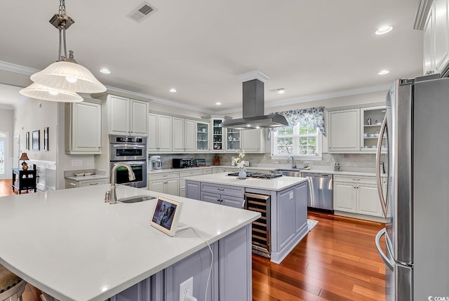 120 Whitemarsh Ct, Murrells Inlet, SC 29576 - kitchen with wine cooler, a sink, appliances with stainless steel finishes, and a center island with sink