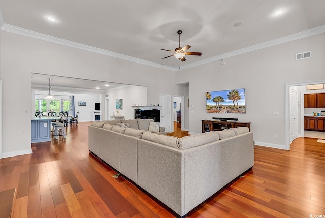 120 Whitemarsh Ct, Murrells Inlet, SC 29576 - living area with a ceiling fan, visible vents, and ornamental molding