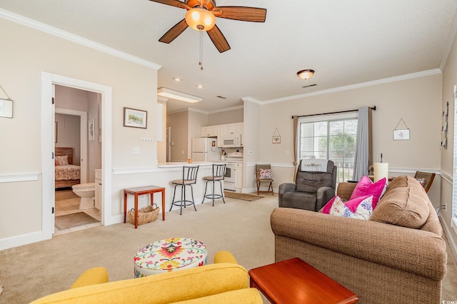 4709 Wild Iris Dr Unit 101, Myrtle Beach, SC 29577 - living room with crown molding, baseboards, a ceiling fan, and light carpet
