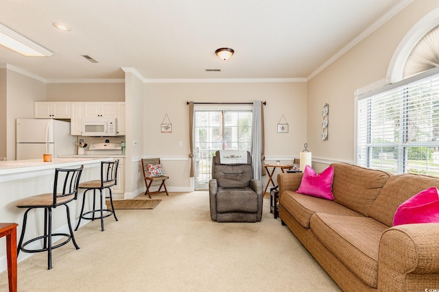 4709 Wild Iris Dr Unit 101, Myrtle Beach, SC 29577 - living room with crown molding, visible vents, light colored carpet, and baseboards