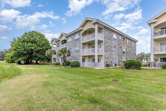4709 Wild Iris Dr Unit 101, Myrtle Beach, SC 29577 - view of building exterior featuring cooling unit