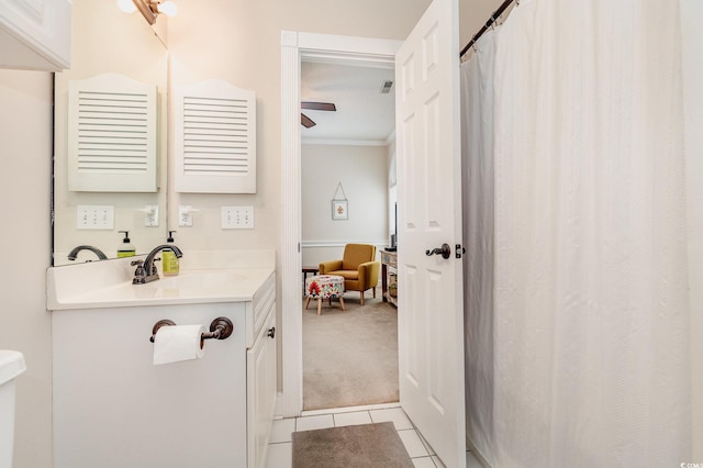 4709 Wild Iris Dr Unit 101, Myrtle Beach, SC 29577 - full bath with curtained shower, tile patterned flooring, toilet, vanity, and ornamental molding