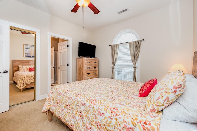 4709 Wild Iris Dr Unit 101, Myrtle Beach, SC 29577 - bedroom featuring carpet flooring, a ceiling fan, and visible vents