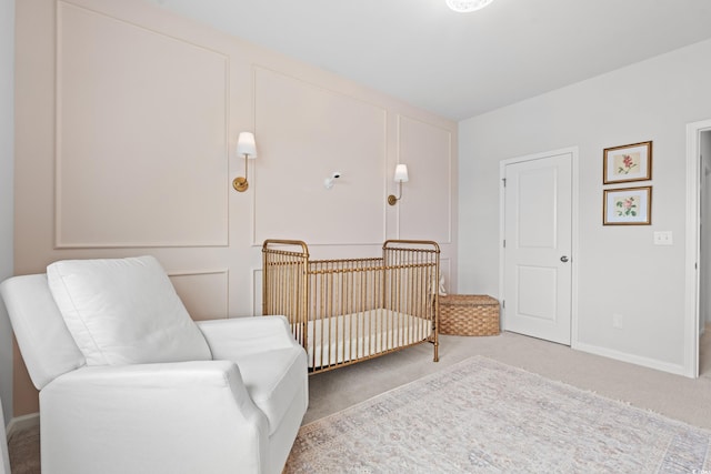 2620 Blue Crane Cir Unit 103, Myrtle Beach, SC 29577 - carpeted bedroom featuring a crib and baseboards