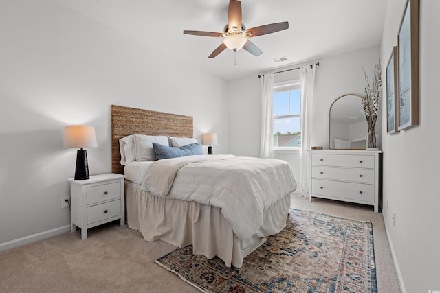 2620 Blue Crane Cir Unit 103, Myrtle Beach, SC 29577 - bedroom with baseboards, light carpet, and a ceiling fan