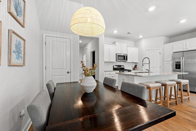 2620 Blue Crane Cir Unit 103, Myrtle Beach, SC 29577 - dining room with light wood-type flooring, recessed lighting, and baseboards