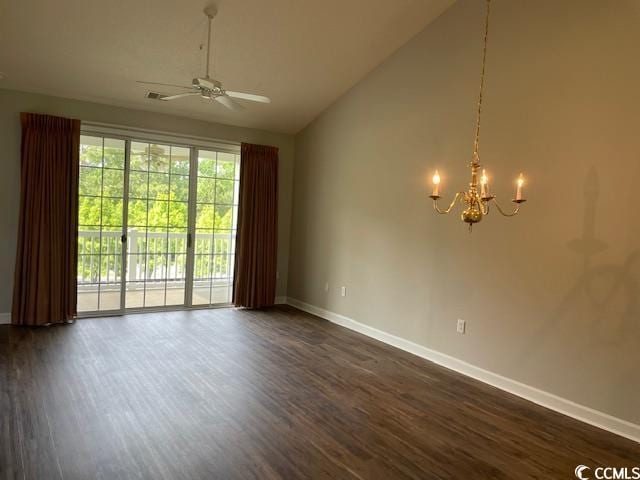 5825 Catalina Dr Unit 234, North Myrtle Beach, SC 29582 - empty room featuring dark wood-style flooring, high vaulted ceiling, ceiling fan with notable chandelier, and baseboards