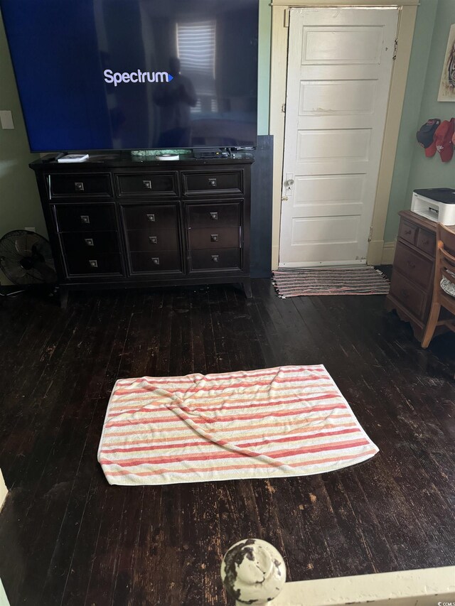 living area with wood-type flooring