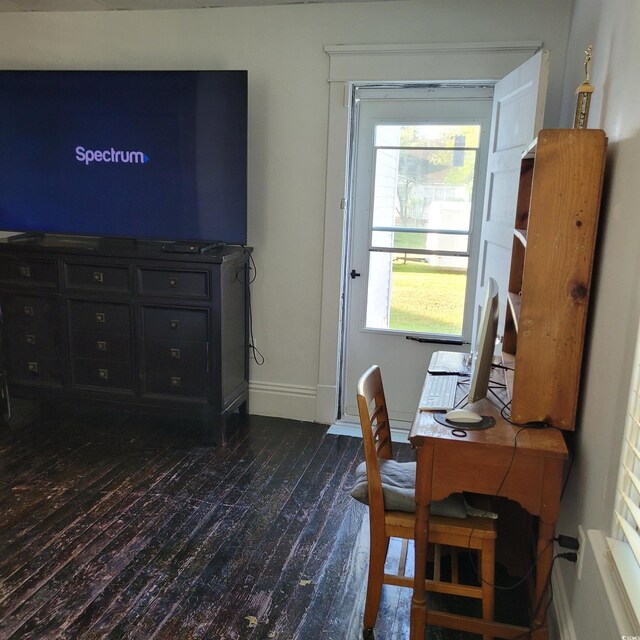 home office with baseboards and dark wood finished floors