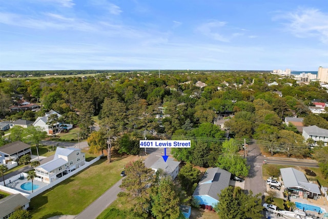 drone / aerial view of a pool area