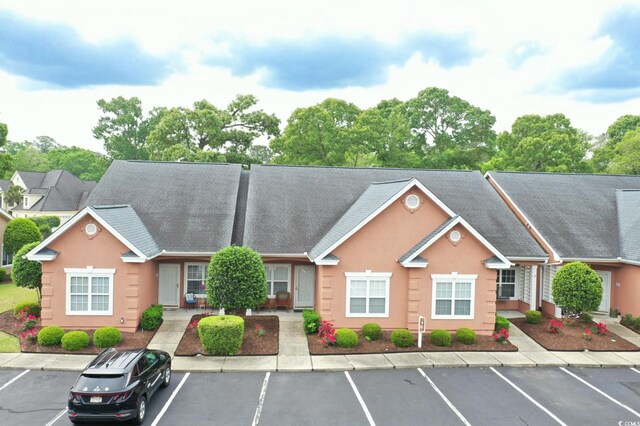 4660 Lightkeepers Way Unit 37B, Little River, SC 29566 - view of building exterior with uncovered parking