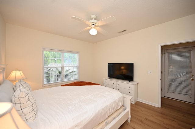 4660 Lightkeepers Way Unit 37B, Little River, SC 29566 - bedroom featuring wood finished floors, baseboards, and ceiling fan