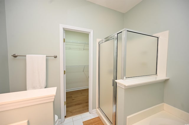 4660 Lightkeepers Way Unit 37B, Little River, SC 29566 - full bath featuring a shower stall, a walk in closet, and tile patterned flooring