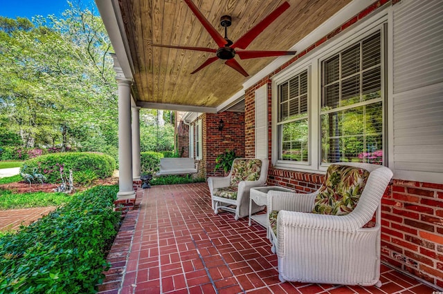 view of patio / terrace featuring a ceiling fan and covered porch