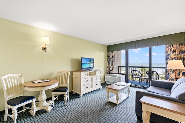 2401 S Ocean Blvd S Unit 267, Myrtle Beach, SC 29577 - carpeted living area with floor to ceiling windows