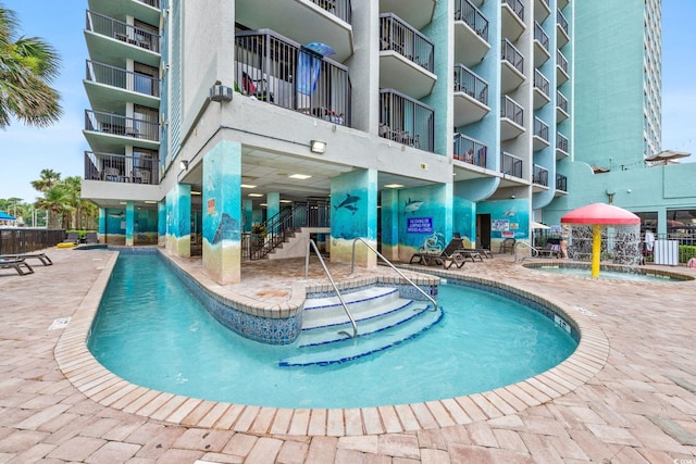 2401 S Ocean Blvd S Unit 267, Myrtle Beach, SC 29577 - community pool featuring a patio and fence