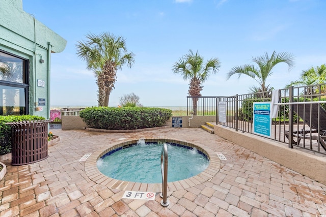 2401 S Ocean Blvd S Unit 267, Myrtle Beach, SC 29577 - view of swimming pool with fence and a hot tub