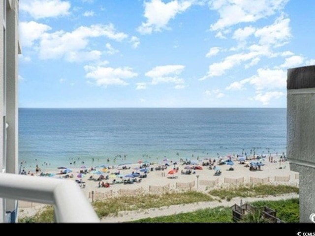 view of water feature with a beach view