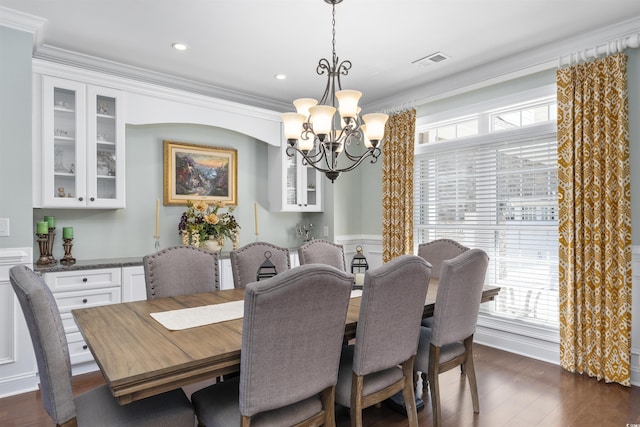 63 Grey Moss Rd, Murrells Inlet, SC 29576 - dining space with a chandelier, healthy amount of natural light, dark wood finished floors, ornamental molding, and recessed lighting
