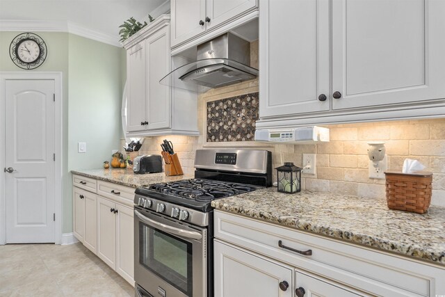 63 Grey Moss Rd, Murrells Inlet, SC 29576 - kitchen featuring stainless steel gas range oven, under cabinet range hood, ornamental molding, light stone countertops, and backsplash