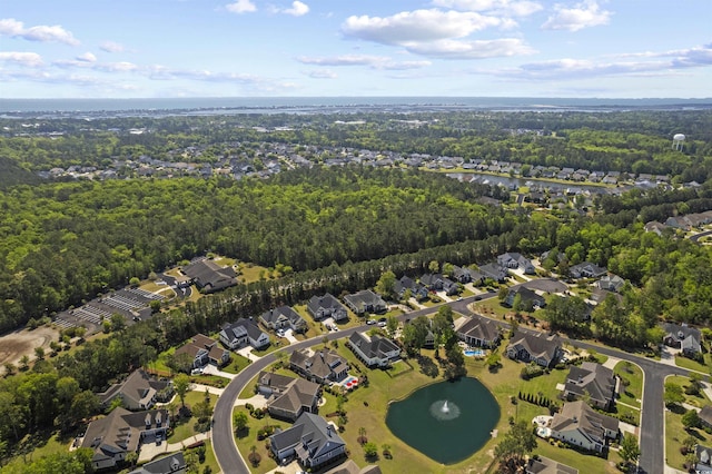 63 Grey Moss Rd, Murrells Inlet, SC 29576 - aerial overview of property's location with a large body of water, nearby suburban area, and a heavily wooded area
