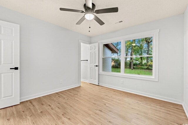 421 Villa Woods Dr, Myrtle Beach, SC 29579 - empty room featuring a ceiling fan, baseboards, visible vents, and light wood finished floors