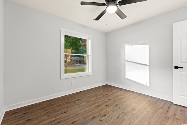 421 Villa Woods Dr, Myrtle Beach, SC 29579 - empty room with baseboards, a ceiling fan, and wood finished floors