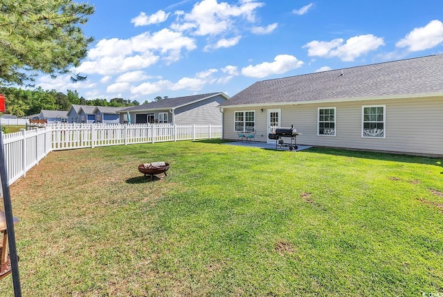 122 Desurrency Ct, Georgetown, SC 29440 - exterior space with a yard, a fire pit, a fenced backyard, and a patio area