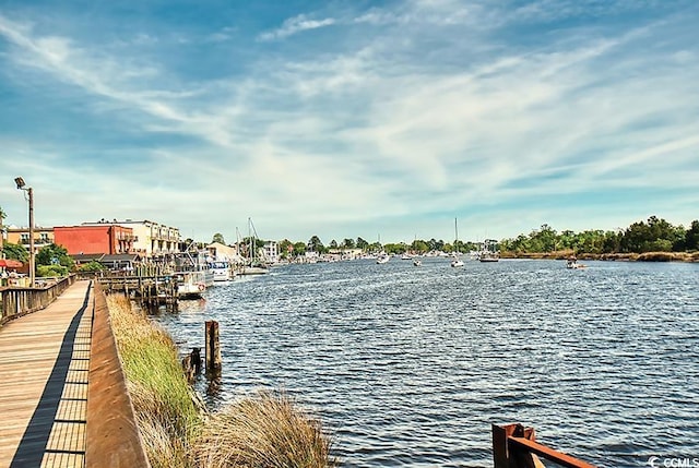 122 Desurrency Ct, Georgetown, SC 29440 - view of dock featuring a water view