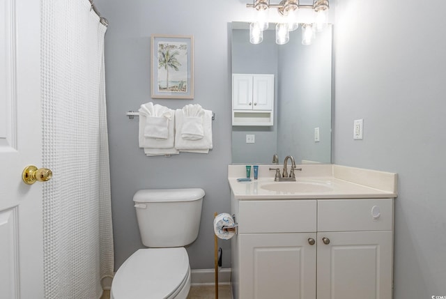6253 Catalina Dr Unit 131, North Myrtle Beach, SC 29582 - bathroom featuring baseboards, toilet, and vanity