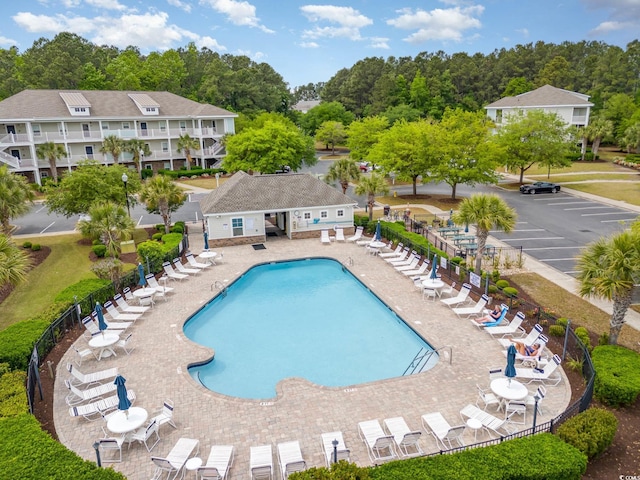 6253 Catalina Dr Unit 131, North Myrtle Beach, SC 29582 - community pool featuring fence and a patio area