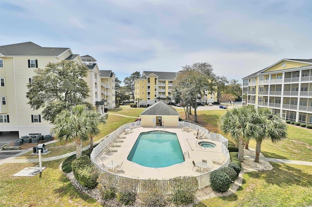 601 Hillside Dr N Unit 1405, North Myrtle Beach, SC 29582 - community pool featuring a lawn, a patio, a hot tub, and central AC