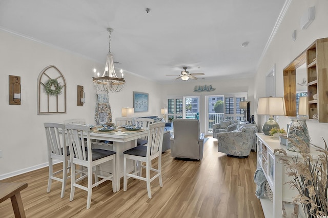 601 Hillside Dr N Unit 1405, North Myrtle Beach, SC 29582 - dining space featuring crown molding, baseboards, ceiling fan with notable chandelier, and light wood finished floors