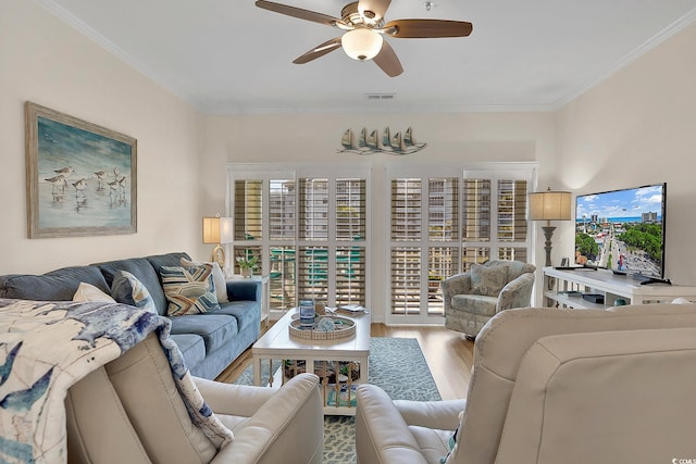 601 Hillside Dr N Unit 1405, North Myrtle Beach, SC 29582 - living area featuring a healthy amount of sunlight, a ceiling fan, wood finished floors, and visible vents