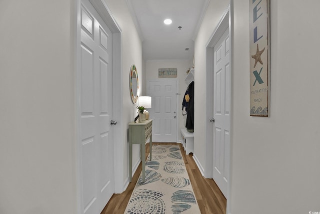 601 Hillside Dr N Unit 1405, North Myrtle Beach, SC 29582 - hallway with baseboards, ornamental molding, and wood finished floors