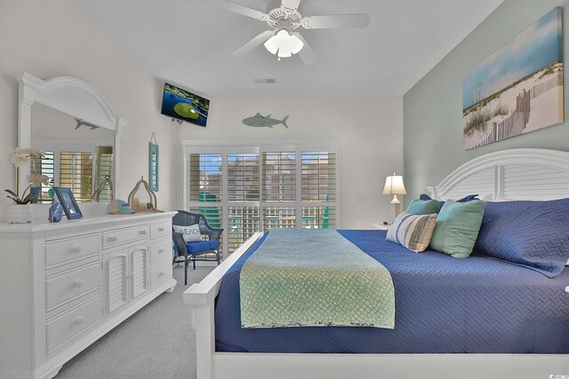 601 Hillside Dr N Unit 1405, North Myrtle Beach, SC 29582 - bedroom featuring multiple windows, a ceiling fan, visible vents, and light colored carpet