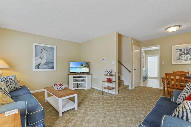 401 77th Ave N Unit 11, Myrtle Beach, SC 29572 - living room with stairway, a textured ceiling, baseboards, and carpet