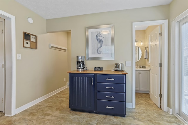 401 77th Ave N Unit 11, Myrtle Beach, SC 29572 - hall with a sink and baseboards