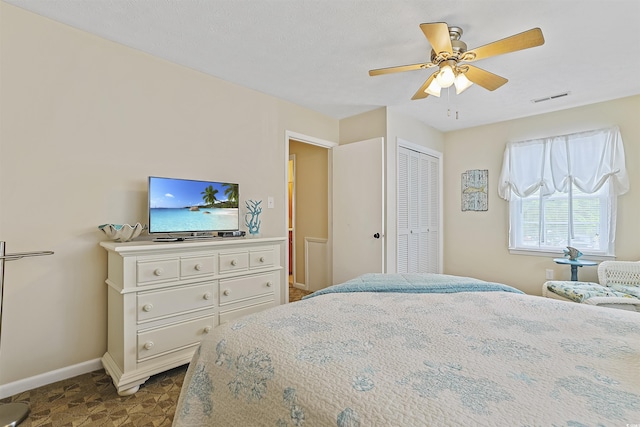 401 77th Ave N Unit 11, Myrtle Beach, SC 29572 - bedroom featuring baseboards and ceiling fan