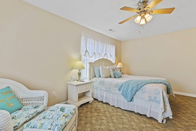 401 77th Ave N Unit 11, Myrtle Beach, SC 29572 - bedroom featuring baseboards and a ceiling fan