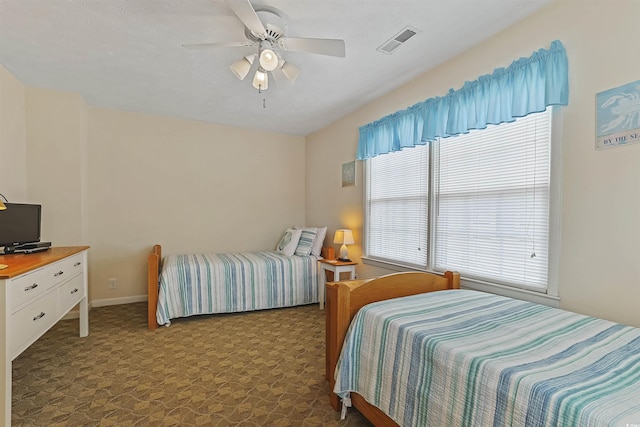 401 77th Ave N Unit 11, Myrtle Beach, SC 29572 - carpeted bedroom featuring ceiling fan and baseboards