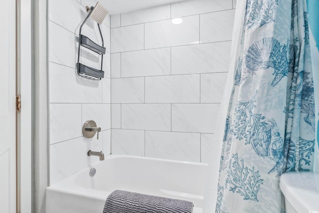 full bathroom featuring shower / bathtub combination with curtain