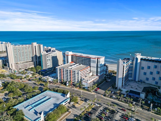 view of urban area with a large body of water