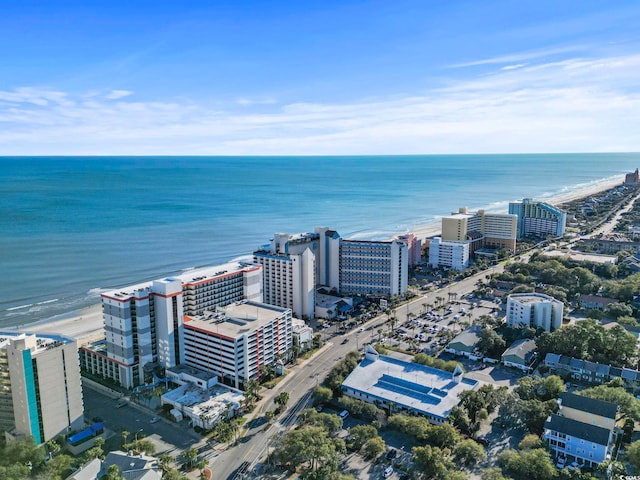 view of urban area featuring a large body of water