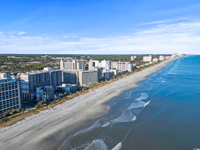 view of urban area with expansive beach