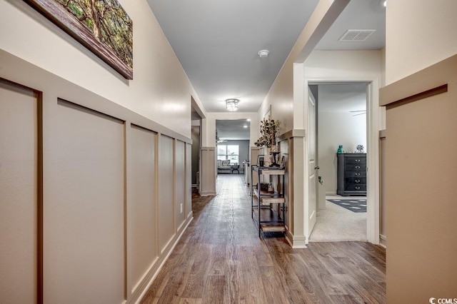 777 Woodland Farms Cir, Aynor, SC 29511 - hallway featuring wood finished floors, visible vents, and baseboards