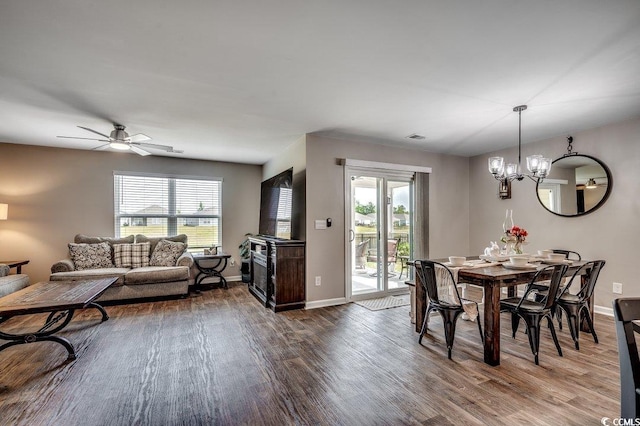 777 Woodland Farms Cir, Aynor, SC 29511 - dining area with ceiling fan with notable chandelier, baseboards, a wealth of natural light, and dark wood finished floors
